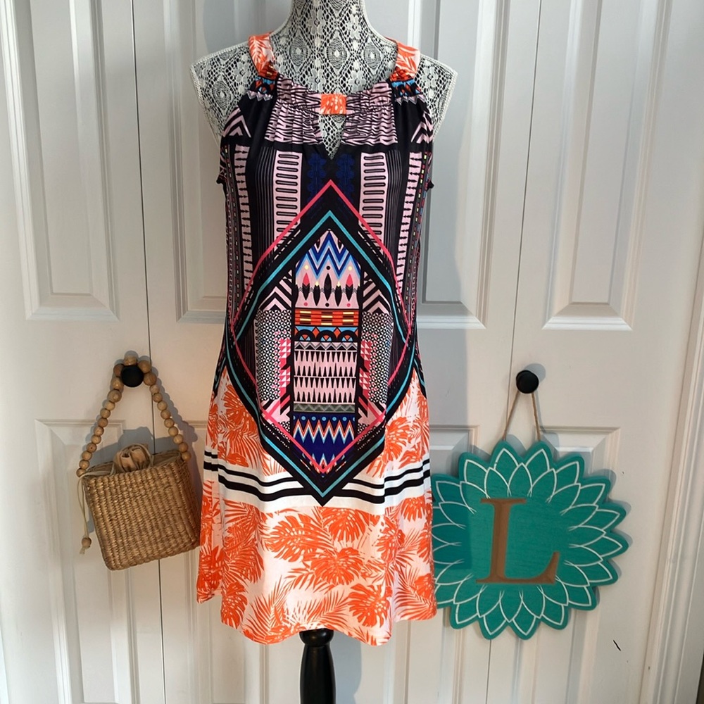 Cute little fun print sleeveless V necked shift dress BNWT.
